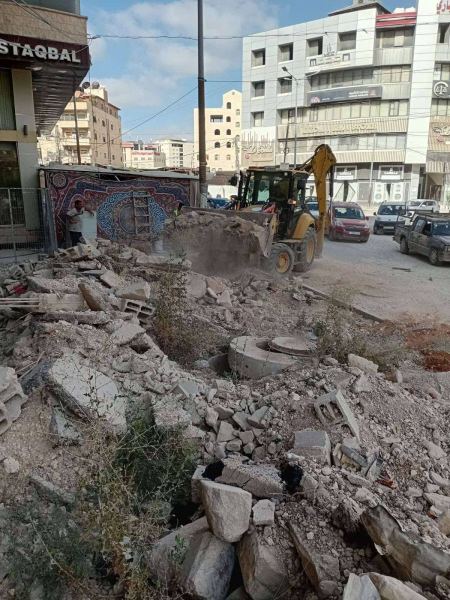 نظيف وادي وعبارات تصريف مياه الامطار في شارع فلسطين 